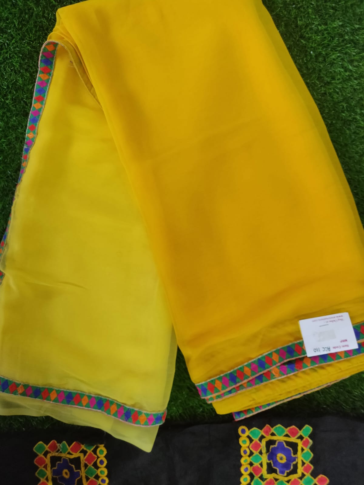 Yellow shaded chiffon saree with Kutchi work Blouse