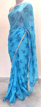 Load image into Gallery viewer, Designer Georgette Blue Floral Printed Pearl Lacer Saree SP29 - Ethnic&#39;s By Anvi Creations